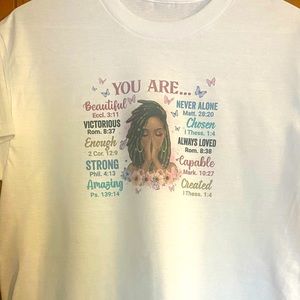 Inspiring black women tee . 60% polyester 40% Cotten
